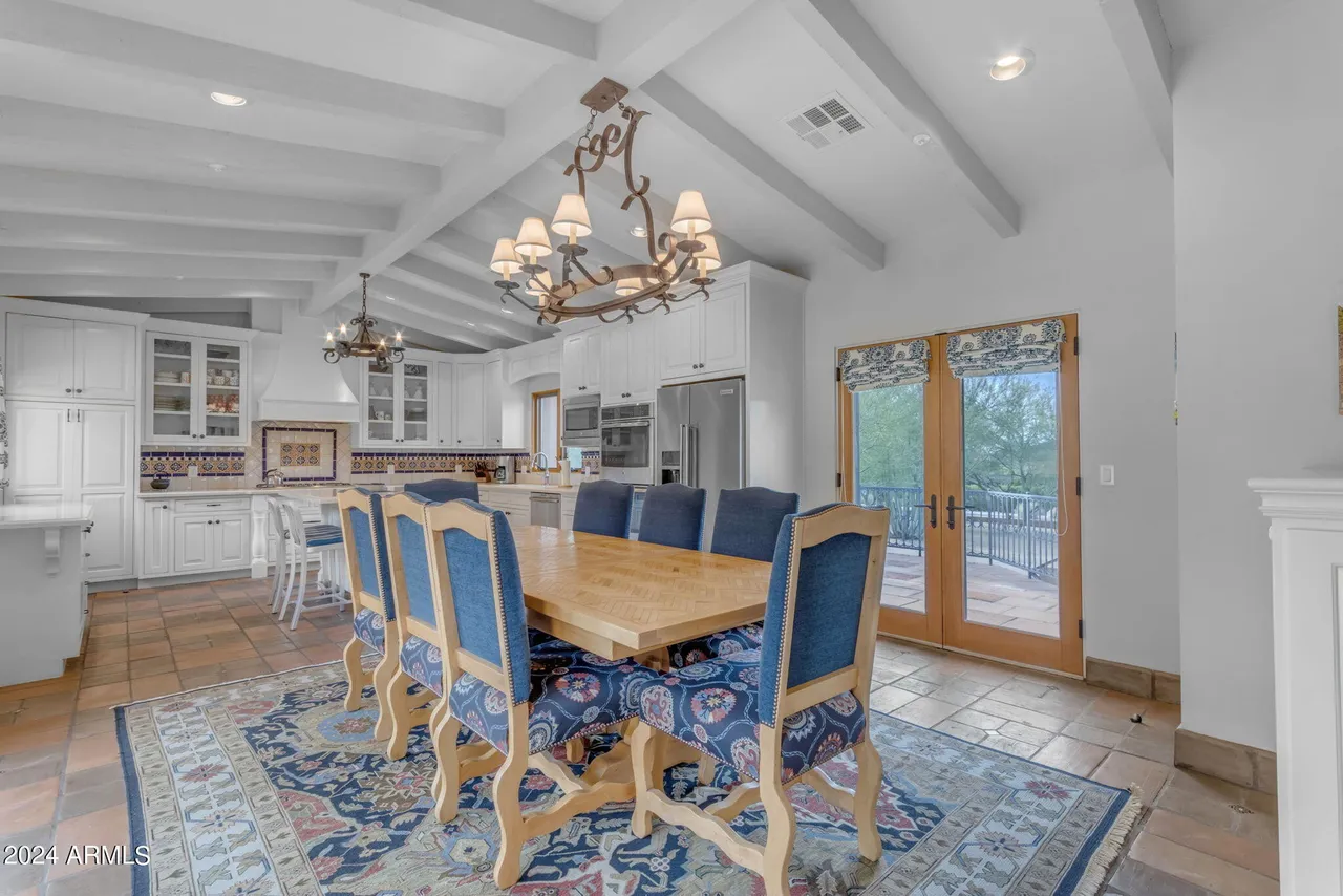 paradise valley homes for sale - image of dining room looking into the living room at 5567 E MCDONALD DR, Paradise Valley